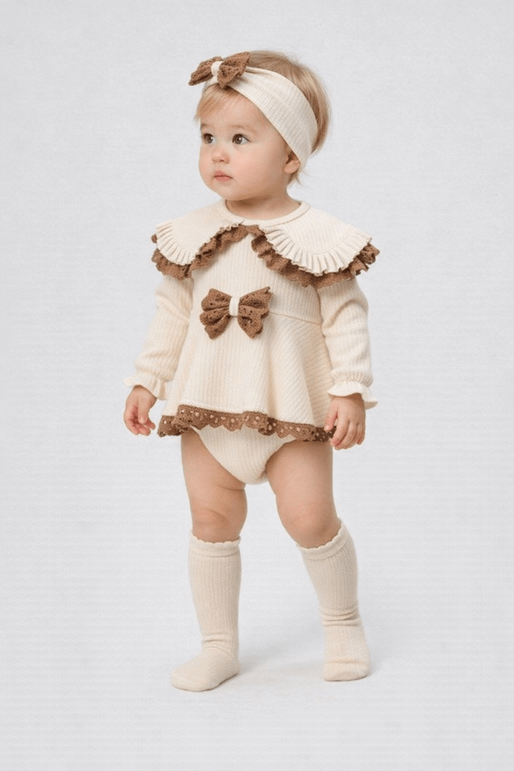 Krem kahverengi fiyonklu kız bebek elbise takım, fitilli kumaş, saç bandı ve çoraplı 3 parça bebek seti